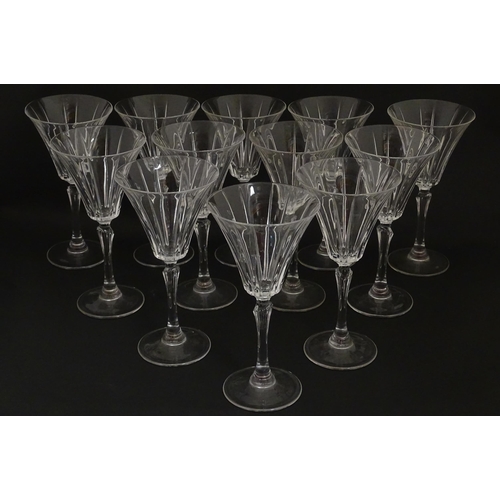 178 - A set of twelve glass wine glasses, in the Novecento pattern by Royal Crystal Rock. Approx. 7 1/2