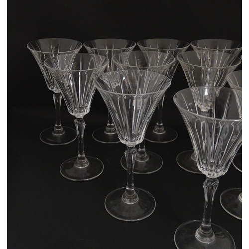 178 - A set of twelve glass wine glasses, in the Novecento pattern by Royal Crystal Rock. Approx. 7 1/2