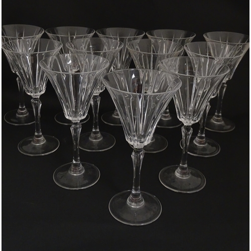 178 - A set of twelve glass wine glasses, in the Novecento pattern by Royal Crystal Rock. Approx. 7 1/2