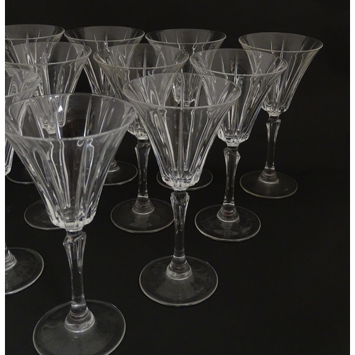 178 - A set of twelve glass wine glasses, in the Novecento pattern by Royal Crystal Rock. Approx. 7 1/2