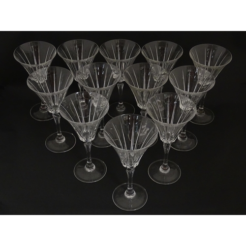 178 - A set of twelve glass wine glasses, in the Novecento pattern by Royal Crystal Rock. Approx. 7 1/2