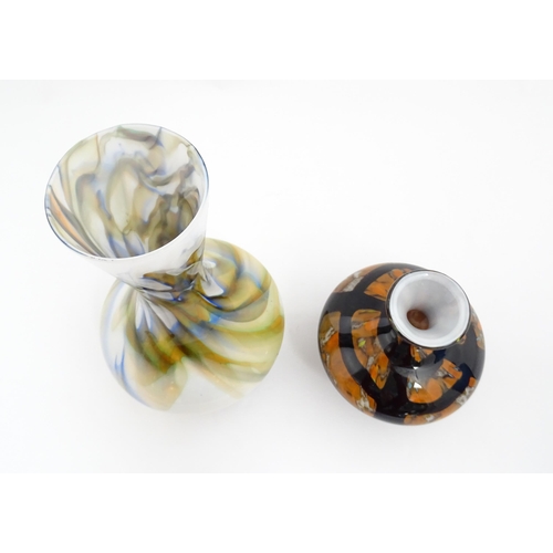 180 - Two 20thC art glass vases, one with white ground having marble detail, the other of squat form havin... 