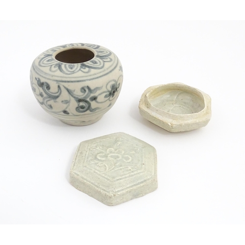 22 - A small Chinese blue and white jarlet of squat form decorated with brushwork floral and foliate deta... 