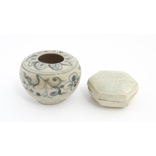 22 - A small Chinese blue and white jarlet of squat form decorated with brushwork floral and foliate deta... 