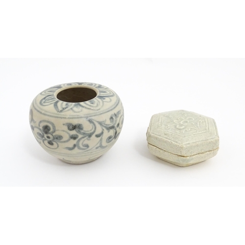 22 - A small Chinese blue and white jarlet of squat form decorated with brushwork floral and foliate deta... 