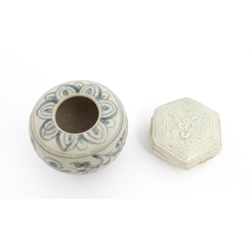 22 - A small Chinese blue and white jarlet of squat form decorated with brushwork floral and foliate deta... 