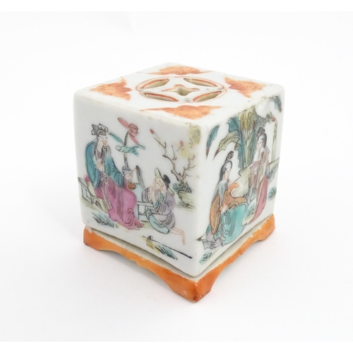 33 - A Chinese cricket box of squared form decorated with scholars in a garden landscape. Together with a... 