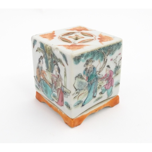 33 - A Chinese cricket box of squared form decorated with scholars in a garden landscape. Together with a... 