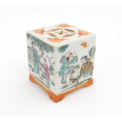 33 - A Chinese cricket box of squared form decorated with scholars in a garden landscape. Together with a... 