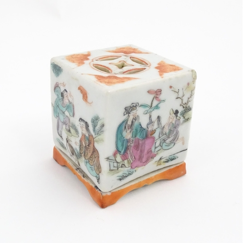 33 - A Chinese cricket box of squared form decorated with scholars in a garden landscape. Together with a... 