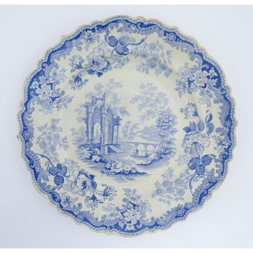 58 - A 19thC Rogers blue and white plate decorated in the Athens pattern. Marked under. Approx. 10 1/2