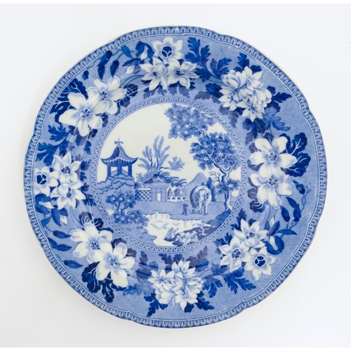 63 - A 19thC Rogers blue and white plate decorated in the Elephant pattern. Impressed marks under. Approx... 