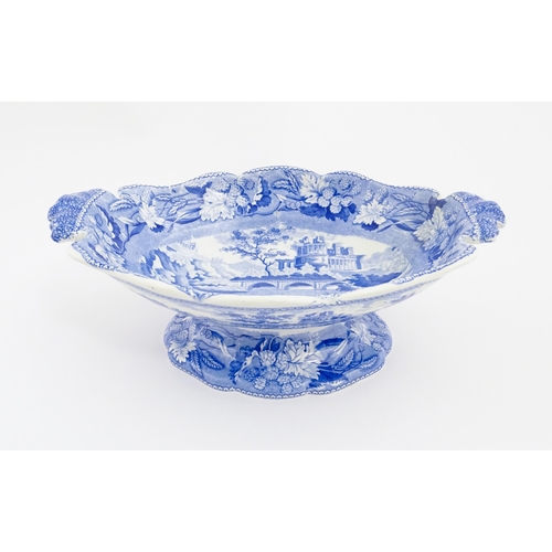 71 - A 19thC Minton blue and white tazza / pedestal dish decorated in the Italian Ruins pattern. Marked u... 