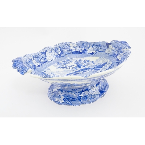 71 - A 19thC Minton blue and white tazza / pedestal dish decorated in the Italian Ruins pattern. Marked u... 