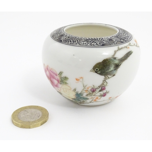 8 - A Chinese brush washer pot decorated with a bird with flowers and foliage. Character marks under. Ap... 