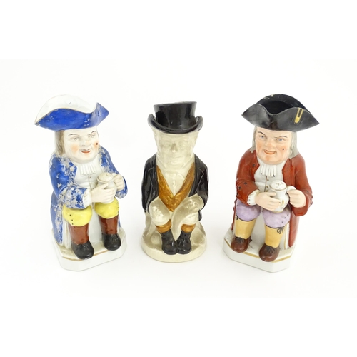 88 - Three assorted Toby / Character jugs, two depicting a seated gentleman with a foaming jug of ale, th... 