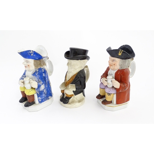 88 - Three assorted Toby / Character jugs, two depicting a seated gentleman with a foaming jug of ale, th... 