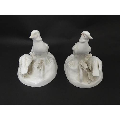 92 - A pair of Crown Staffordshire white glazed bird groups modelled as pheasants by J. T. Jones Approx. ... 