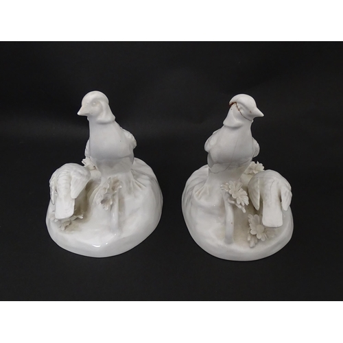 92 - A pair of Crown Staffordshire white glazed bird groups modelled as pheasants by J. T. Jones Approx. ... 