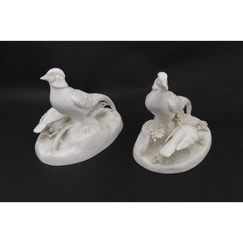 92 - A pair of Crown Staffordshire white glazed bird groups modelled as pheasants by J. T. Jones Approx. ... 