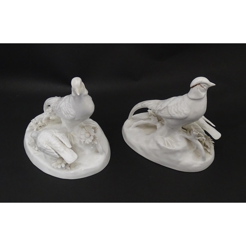 92 - A pair of Crown Staffordshire white glazed bird groups modelled as pheasants by J. T. Jones Approx. ... 