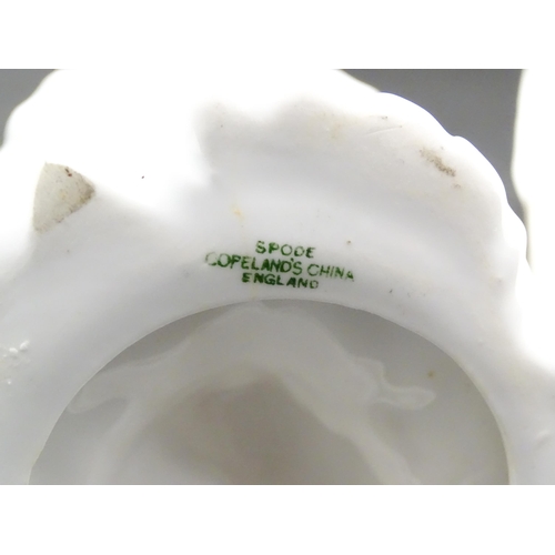 93 - A Spode tazza / comport with cherub and scroll detail to base. Together with another with caryatid c... 