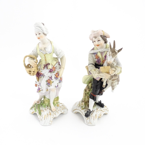 97 - Two Continental porcelain figures modelled as a travelling musician and companion, the male figure h... 