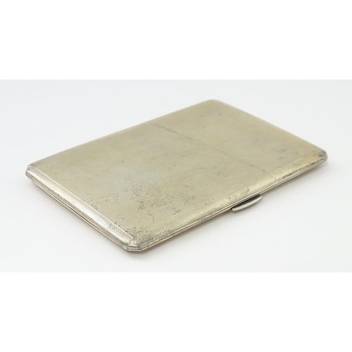 272 - An Art Deco silver cigarette case with engine turned decoration. Hallmarked Birmingham 1945 maker D.... 