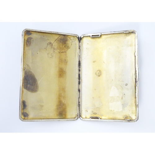 272 - An Art Deco silver cigarette case with engine turned decoration. Hallmarked Birmingham 1945 maker D.... 