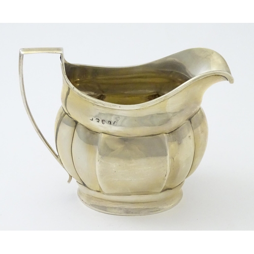 282 - A George III silver cream jug,  hallmarked London c1805. Approx 4