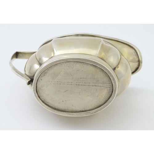 282 - A George III silver cream jug,  hallmarked London c1805. Approx 4