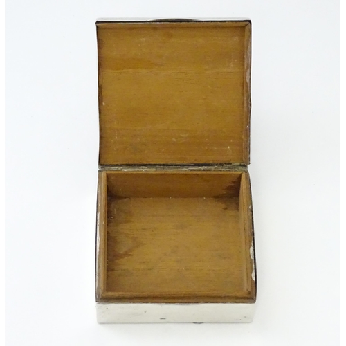 293 - A silver cigarette box hallmarked Birmingham 1921, maker I S Greenberg & Co. Approx. 3 1/4