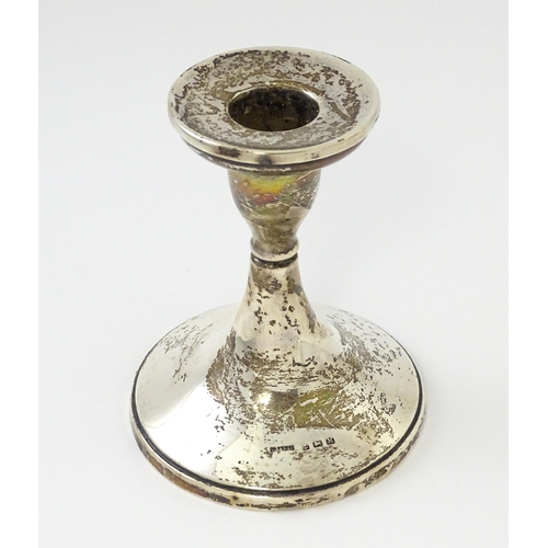 313 - A silver candlestick hallmarked Birmingham 1936 maker S Blanckensee & Son Ltd. Approx 4 1/2