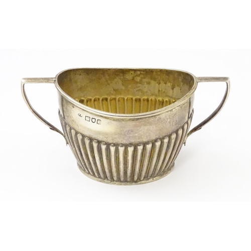 325 - A silver twin handled sugar bowl. hallmarked London 1901. Approx. 5