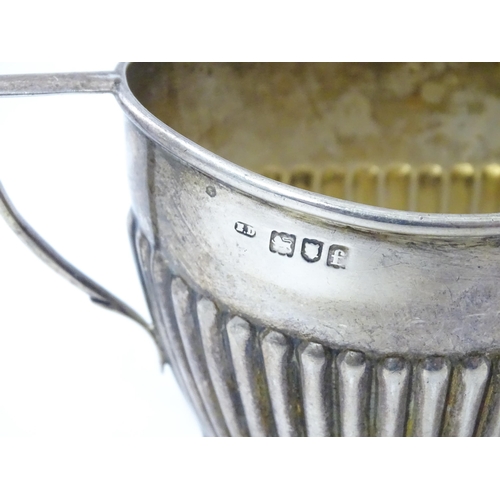 325 - A silver twin handled sugar bowl. hallmarked London 1901. Approx. 5