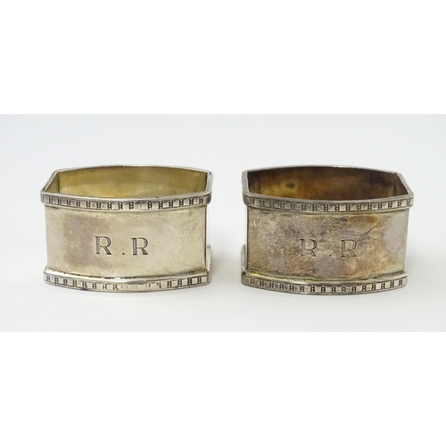 327 - Ten silver napkin rings to include a pair hallmarked Birmingham 1937 maker Adie Bros Ltd. Two hallma... 