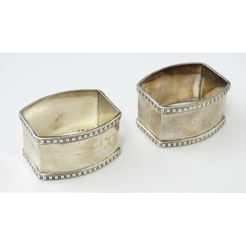 327 - Ten silver napkin rings to include a pair hallmarked Birmingham 1937 maker Adie Bros Ltd. Two hallma... 