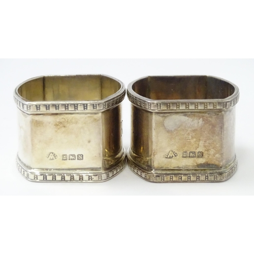 327 - Ten silver napkin rings to include a pair hallmarked Birmingham 1937 maker Adie Bros Ltd. Two hallma... 