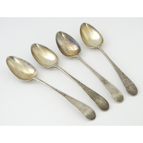 330 - A set of four Geo III old English tea spoons, hallmarked London 1785 maker Samuel Godbehere. Approx ... 