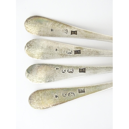 330 - A set of four Geo III old English tea spoons, hallmarked London 1785 maker Samuel Godbehere. Approx ... 