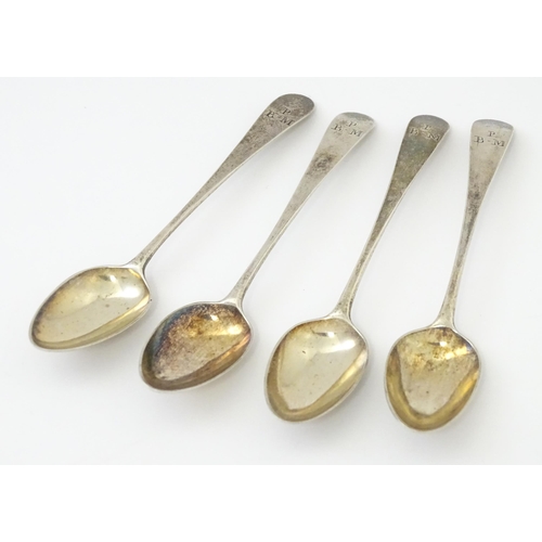 330 - A set of four Geo III old English tea spoons, hallmarked London 1785 maker Samuel Godbehere. Approx ... 