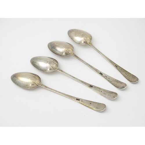 330 - A set of four Geo III old English tea spoons, hallmarked London 1785 maker Samuel Godbehere. Approx ... 