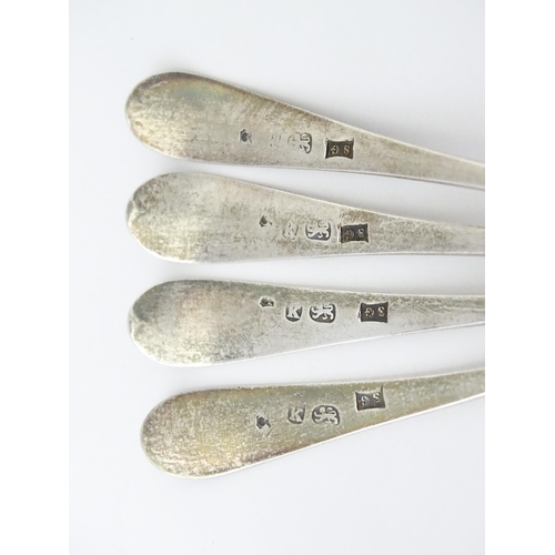 330 - A set of four Geo III old English tea spoons, hallmarked London 1785 maker Samuel Godbehere. Approx ... 