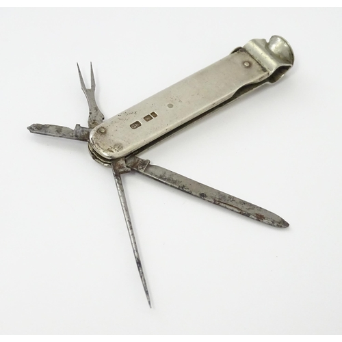 341 - A silver cigar tool of penknife form with cutter to one end and fold out knife and spike etc. Hallma... 