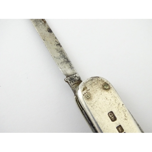 341 - A silver cigar tool of penknife form with cutter to one end and fold out knife and spike etc. Hallma... 