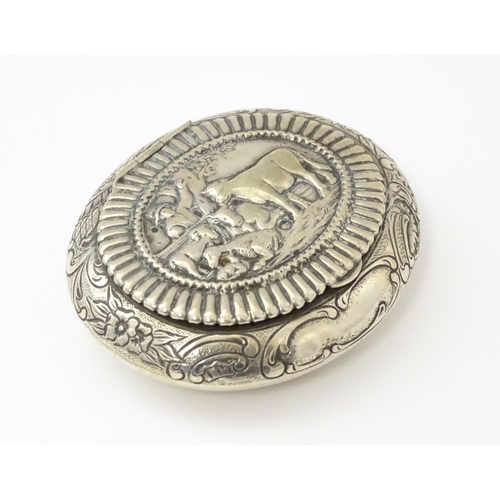 362 - A Dutch silver snuff box / tobacco box of ovoid form, the lid decorated with pastoral scene with fig... 