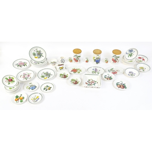 145 - A quantity of Portmeirion dinner wares to include plates, serving dishes, bowls, butter dish and cov... 