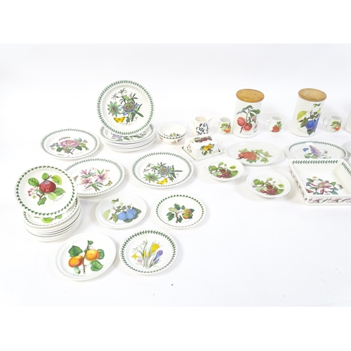 145 - A quantity of Portmeirion dinner wares to include plates, serving dishes, bowls, butter dish and cov... 