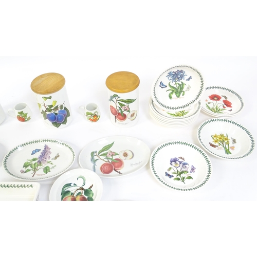 145 - A quantity of Portmeirion dinner wares to include plates, serving dishes, bowls, butter dish and cov... 