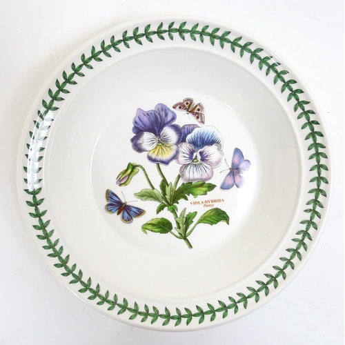 145 - A quantity of Portmeirion dinner wares to include plates, serving dishes, bowls, butter dish and cov... 